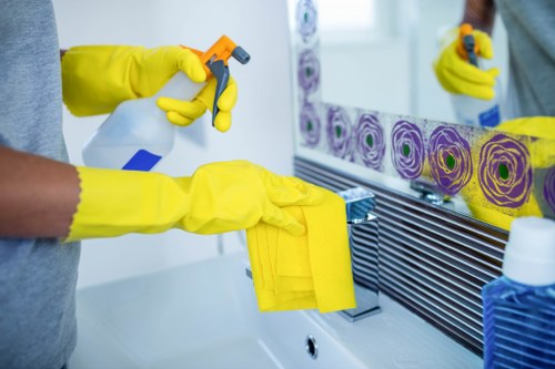 Detail cleaning of kitchen surfaces during a deep cleaning service