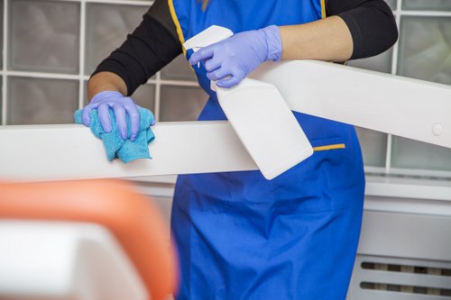 Detailed deep cleaning of modern Canary Wharf interior surfaces and fixtures